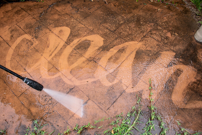 Clean Words Pressure Washed into Floor Surface