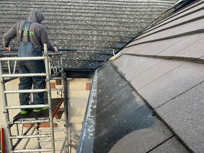 External Cleaning steaming a modern tiled roof