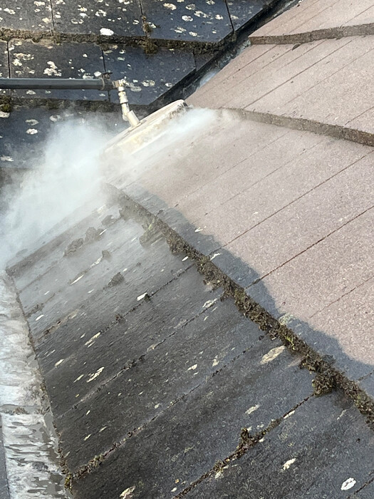 Closeup of roof steam clean